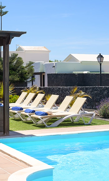 Sun terrace with loungers at Villa Aguamarina 30 Sun loungers by the pool at Hipoclub Villa Aguamarina 30