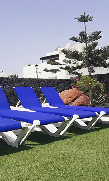 Sun loungers in the garden Sun loungers in the garden of Hipoclub Villa Aguamarina 11